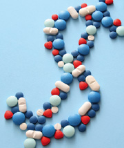 Health IT/Pills in shape of a dollar sign/stock photo